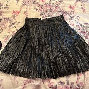 Trendy Calvin Klein black vegan leather pleated a-line skirt